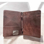 Lola tooled leather folder. Gorgeous, tooled longhorn on front.