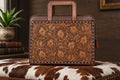 Hand tooled leather briefcase.