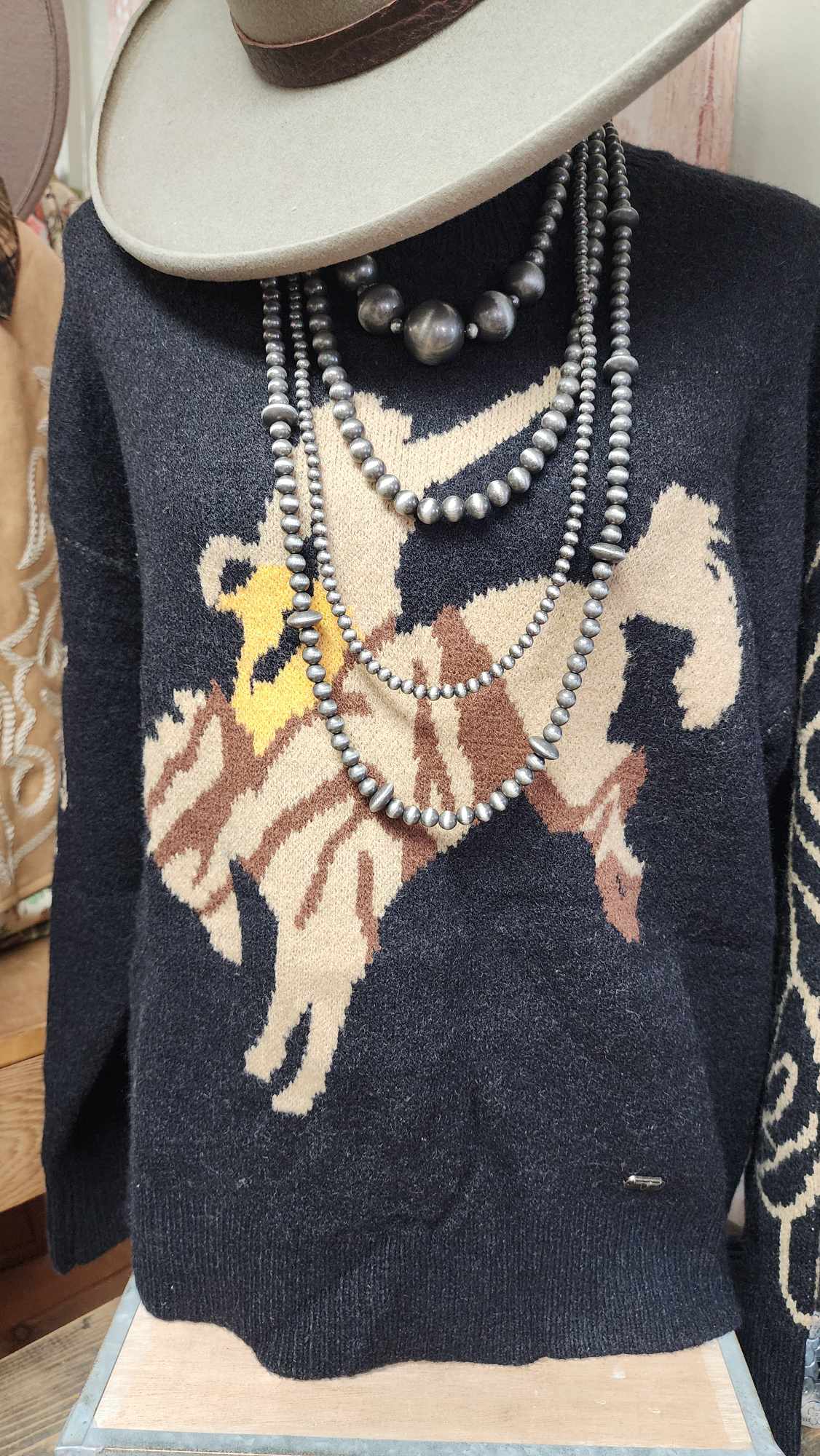 Bucking. Bronc Sweater
